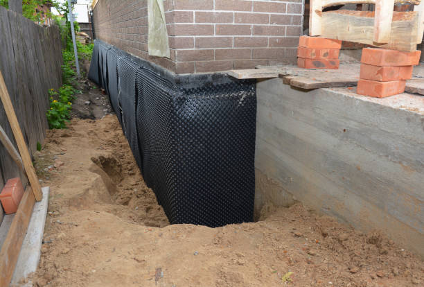 SJ Waterproofing Pros technician performing targeted Waterproofing assessment in Norwood, OH